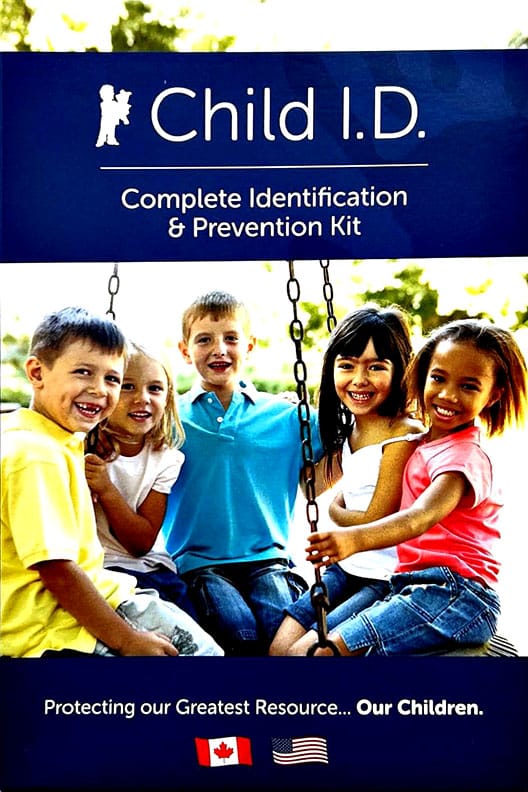 Child ID kit cover featuring diverse group of smiling kids on a swing